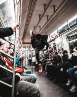josh-gordon-breakdance flip in Subway-unsplash